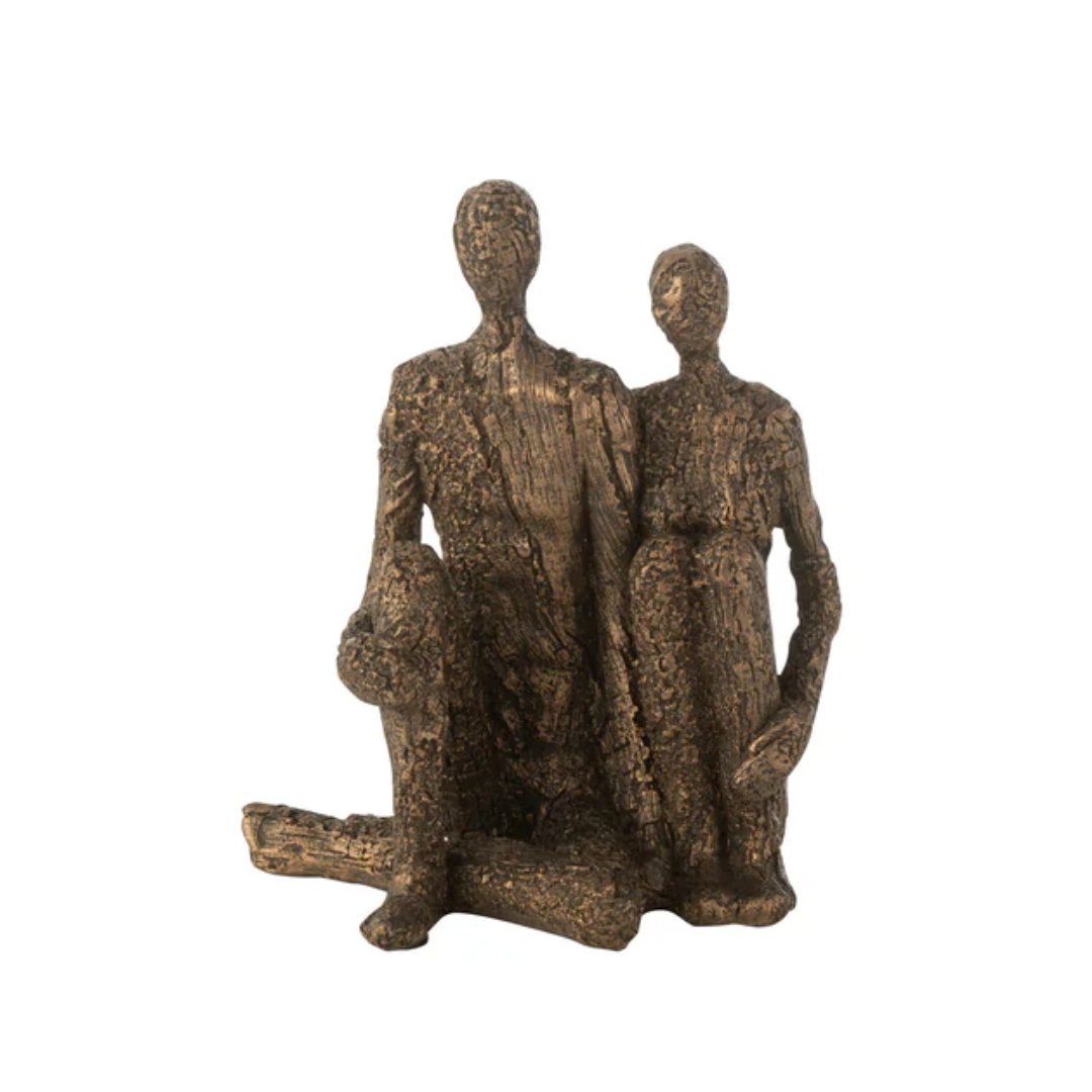 Stel zittend omhelzing hars bruin/goud